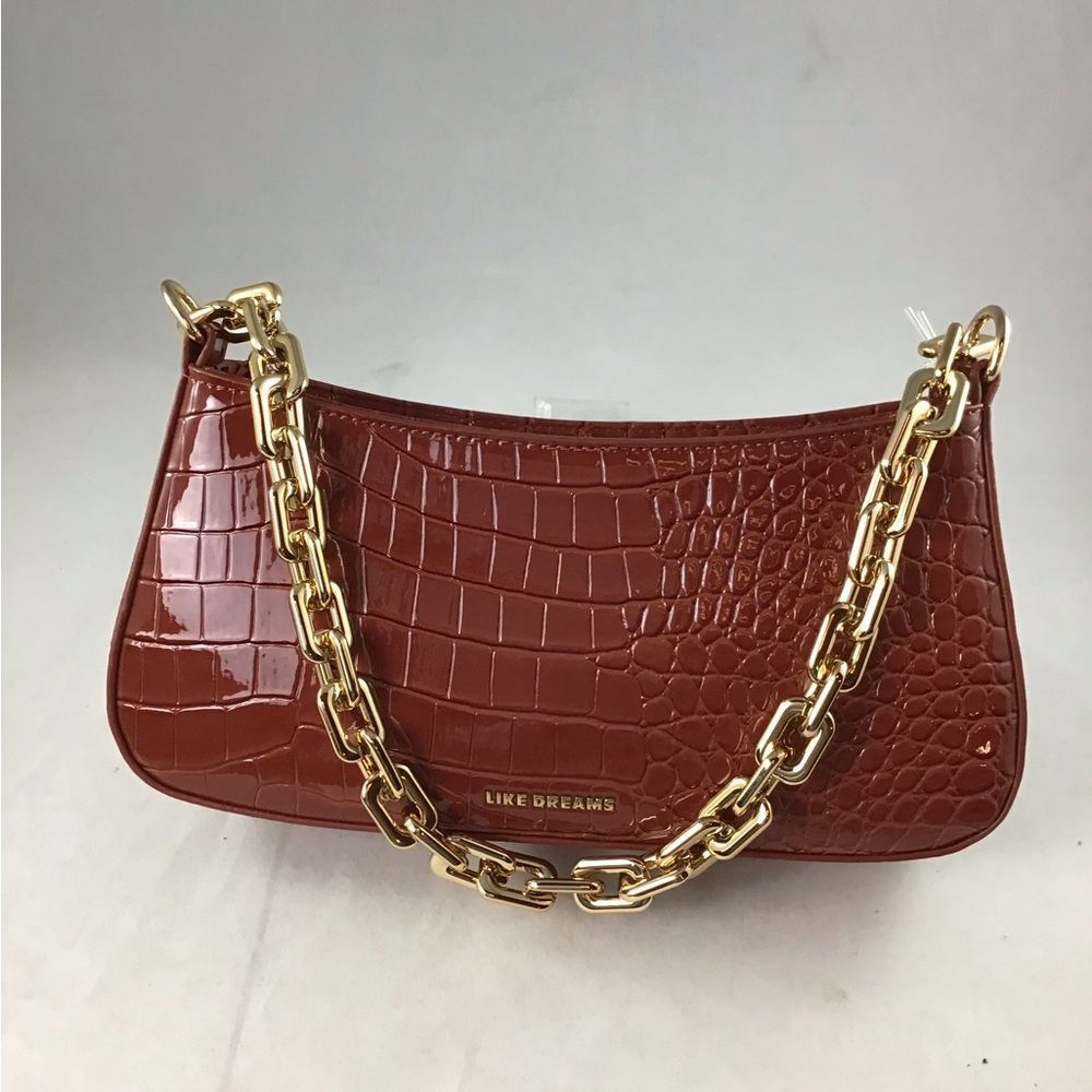 Like Dreams patent vegan croc print rust purse.